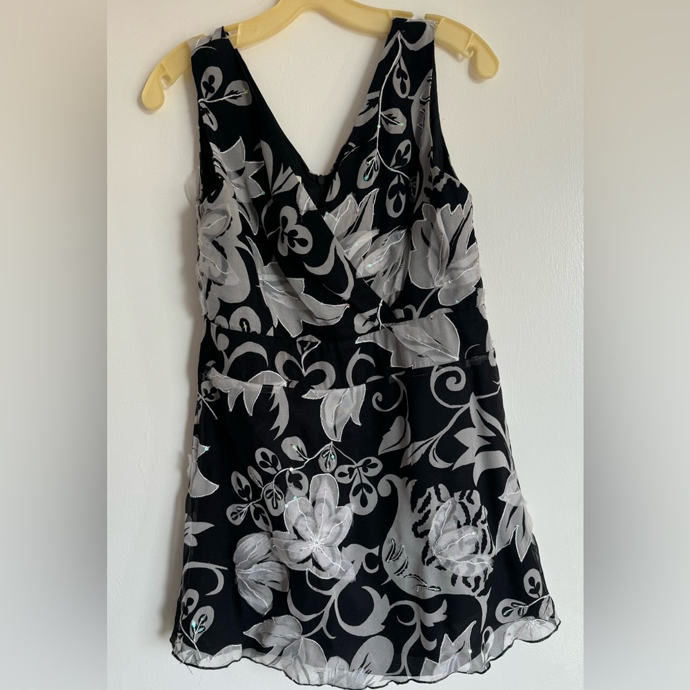 Vneck black blouse with appliqué flowers. LongLegs.ca brand for tall women.